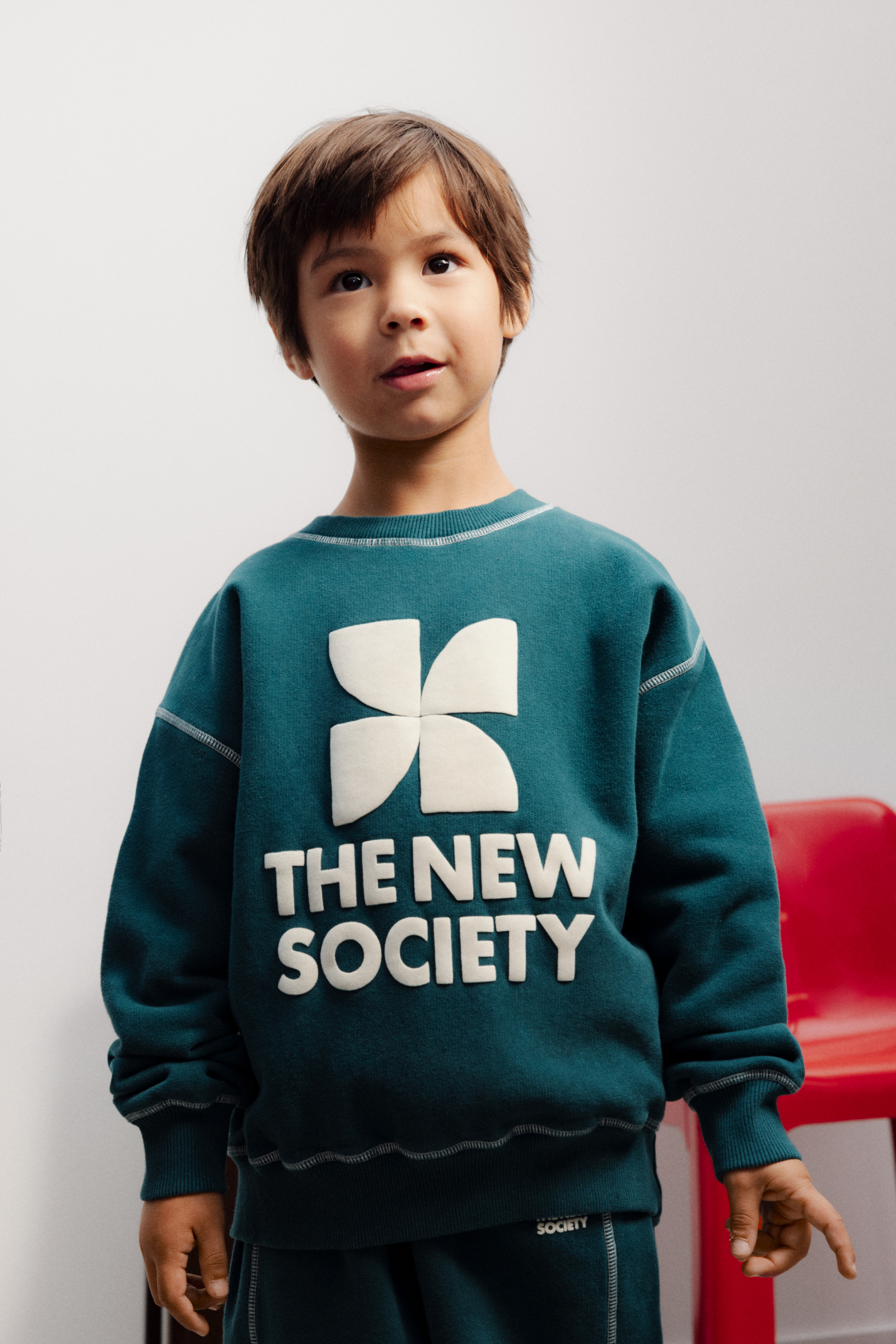 The New Society logo sweatshirt dark sea sfeer
